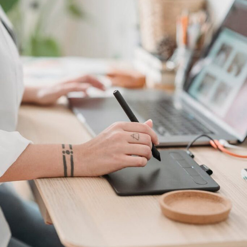 someone using a wacom tablet
